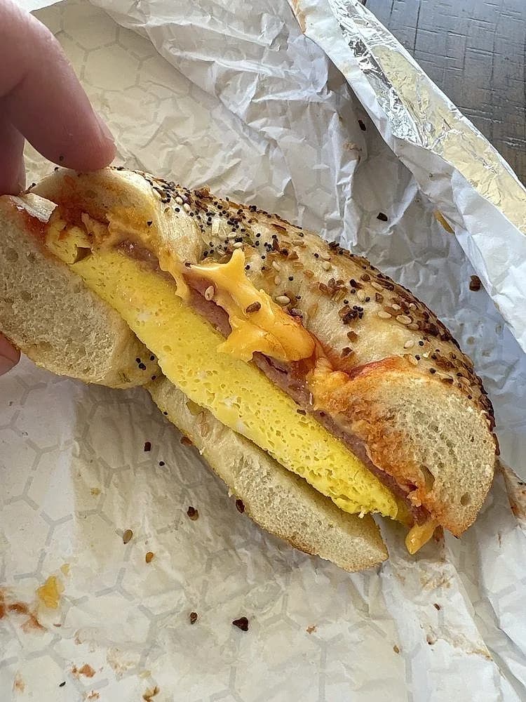 A pork roll, egg, and cheese sandwich on an everything bagel