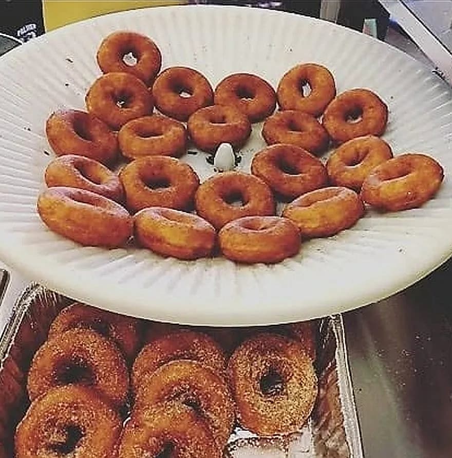 A plate of fresh cinnamon-sugar donuts, just out of the machine at Marvel's